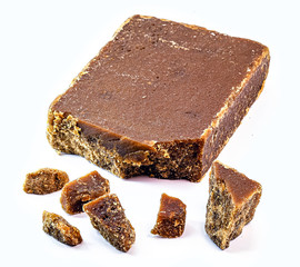 Sweet made from sugar cane of Azorean or Canarian origin, called Rapadura, pan, cardboard, piloncillo, chancaca, empanisation and tapa-doce. . Isolated white background.