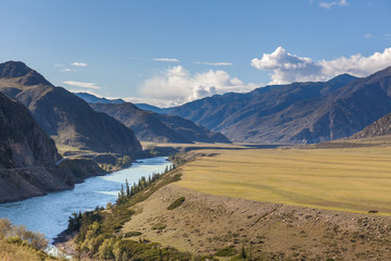 White mountain river in Altai. Altay where Russia, China, Mongolia, and Kazakhstan come together, and where the rivers Ob and Irtysh have their headwaters. Russia