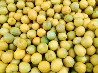 Fresh lemons at market, full frame