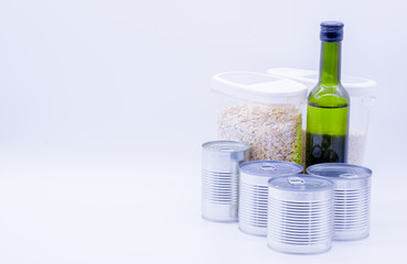 Donation box with canned food, oil, oatmeal, peas and corn, food stock for quarantine, isolation...