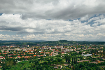 Beautiful panoramic view of Mukachevo, Ukraine from the top of The Palanok Castle or Mukachevo Castle at bright sunny day