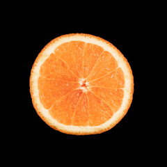 Round orange segment isolated on a black background