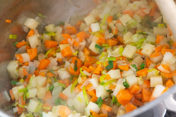 Frozen soup vegetables in a metal bowl