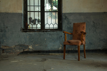 old chair in the abandoned house