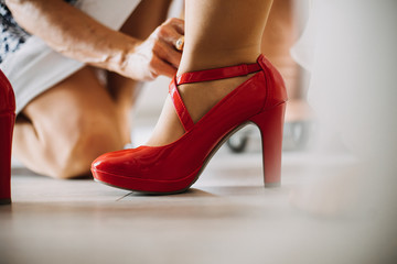 a woman trying out a shoes in a store