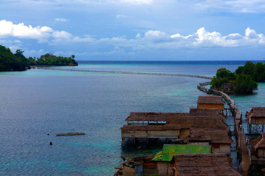malenge island's 1 km bridge to pulau palan in togian islands in indonesia