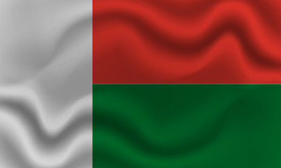 national flag of Madagascar on wavy cotton fabric. Realistic vector illustration.