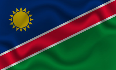 national flag of Namibia on wavy cotton fabric. Realistic vector illustration.