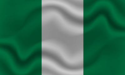 Obraz premium national flag of Nigeria on wavy cotton fabric. Realistic vector illustration.