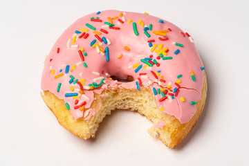 donut with sprinkles on white background
