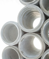 Stack of new concrete pipes.