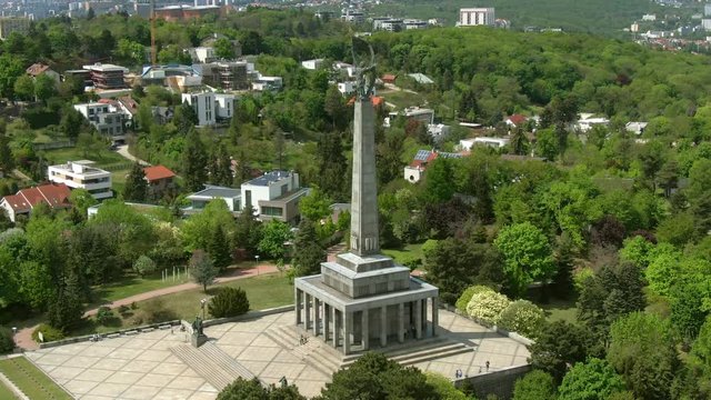 Aerial of Slavin Memorial, Bratislava Slovakia - Establishing Crane Shot of Slavin Memorial National Cultural Monument and Military Cemetery of Soviet Soldiers, During a Sunny Spring Day