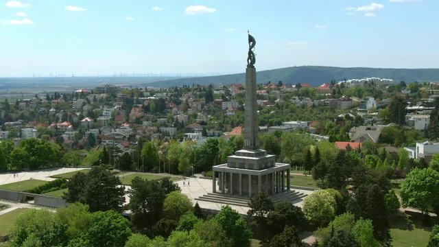 Aerial of Slavin Memorial, Bratislava Slovakia - Establishing Rotating Pan Shot of Slavin Memorial National Cultural Monument and Military Cemetery of Soviet Soldiers, During a Sunny Spring Day