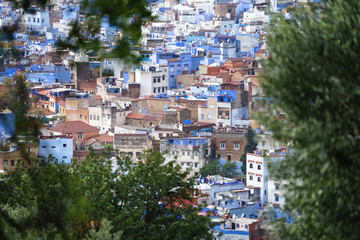 Fototapeta premium Aerial close up of the unique blue Medina of Chefchaouen in the Rif Mountains, Morocco