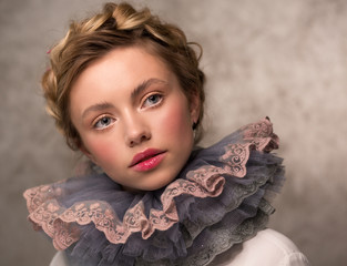 Portrait of a woman in a vintage medieval collar. Countess or princess. Lush ruff in the neck...