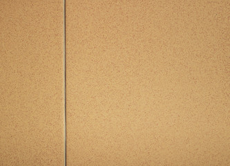 Fototapeta premium Beige wall tiles with inclusions