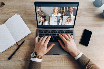 Online business meeting. Business team working from home in a video conference. The guy...