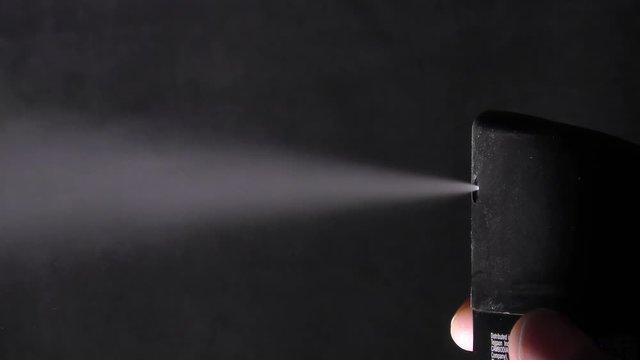 Strean of gas coming out of bottle of deodorant