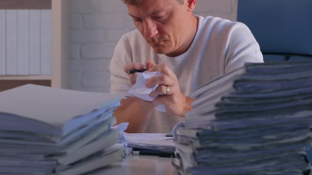 Office clerk working paperwork and files from home, work overload and bureaucracy concept
