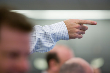 Hands gesturing making a point in business meeting