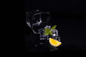 glass with ice mint and lemon