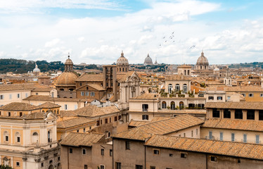 Fototapeta na wymiar Italian Terracotta Rooftops and St Peter's Basilica Dome, Rome, Italy