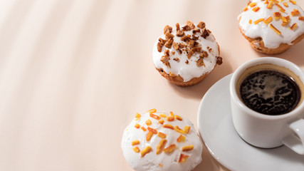 Dessert coffee with Muffins on light table. Close up, copy space.