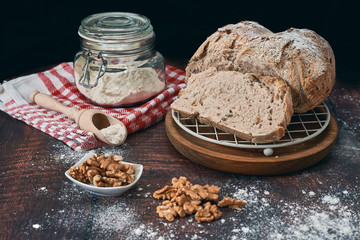 Rustic homemade bread stuffed with walnuts and baked at home in the traditional style