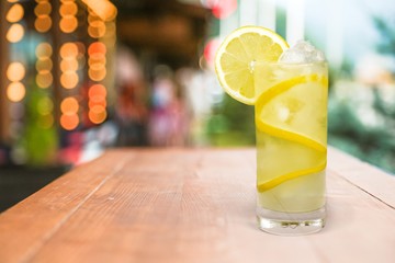 Lemonade with fresh slice lemon on desk