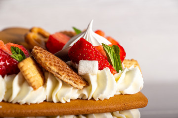 Сake heart cake with strawberries and mint