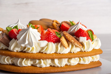 Сake heart cake with strawberries and mint