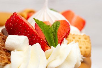 Сake heart cake with strawberries and mint