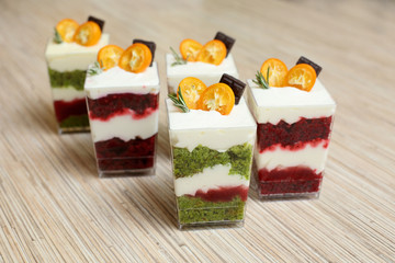 desserts from sponge cake with cream in jars