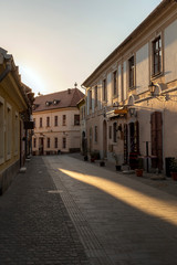 Fototapeta na wymiar Empty street in Eger, Hungary on a spring evening.