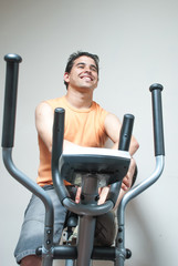 young guy is training at home during a pandemic