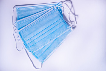 Protective face masks for coronavirus isolated on white background. Covid-19. Top view.