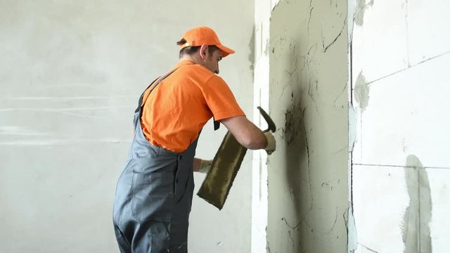 Plasterer putting plaster on wall. 4k