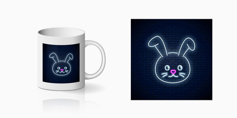 Neon sign of cute rabbit in kawaii style print for cup design. Cartoon happy smiling bunny design, banner in neon style and mug mockup. Vector shiny design element