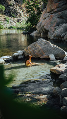 Fototapeta premium Young girl dreaming in a hot tub