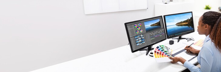 Editor Editing Video On Computer