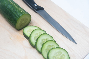 cucumber on cutting board