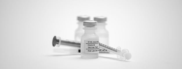Covid-19 Vaccine Test Vial Syringes Closeup