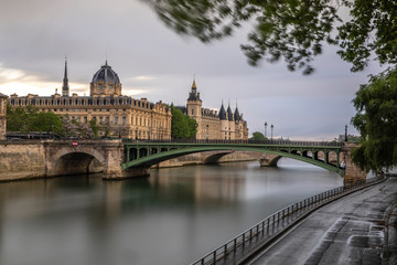 Fototapeta na wymiar Paris, France - April 28, 2020: Panoramic view of the Conciergerie, the Hotel Dieu and the bridges over the Seine during the containment measures due to the coronavirus