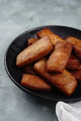 Malabar deep fried milk cake or Paal cake served with tea / Ramadan Snacks