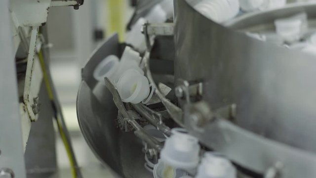 plastic bottles on Medical Solutions Conveyor . Blow fill seal technology technique used to produce liquid-filled container on medical or food industrial factory. medical industry