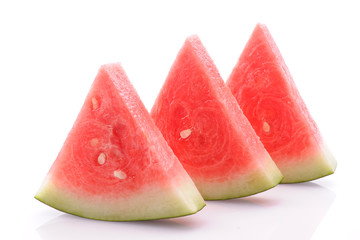 Three slices of ripe watermelon isolated on white