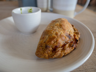 Empanada with chimichurri sauce 