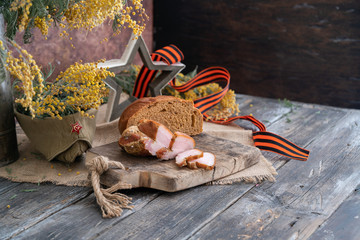 Garrison cap, mimosa blossom, George ribbon are symbol of Victory day. Holiday card with order, St....