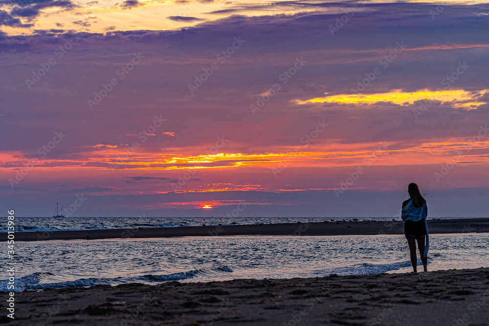 Wall mural sunset on the beach on north side of the provincelands cape cod, atlantic ocean view ma us.