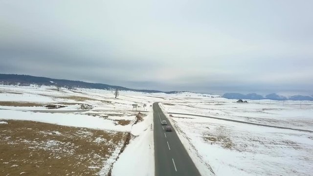 Drone following 2 cars on the high way